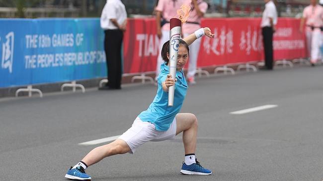 第十三届全运会火炬在天津西青区传递